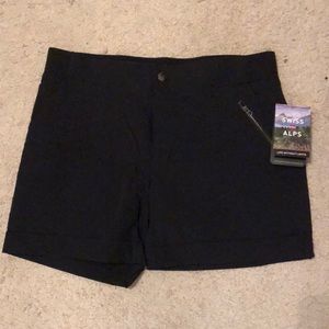 Women’s large black Swiss alps snap shorts with zipper pocket on front.
